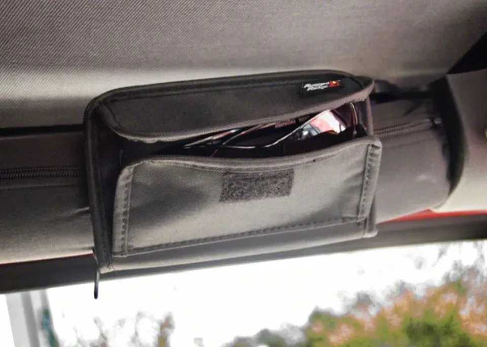 The Jeep Wrangler Sunglass Holder Dilemma: Why Jeeps Lack Storage
